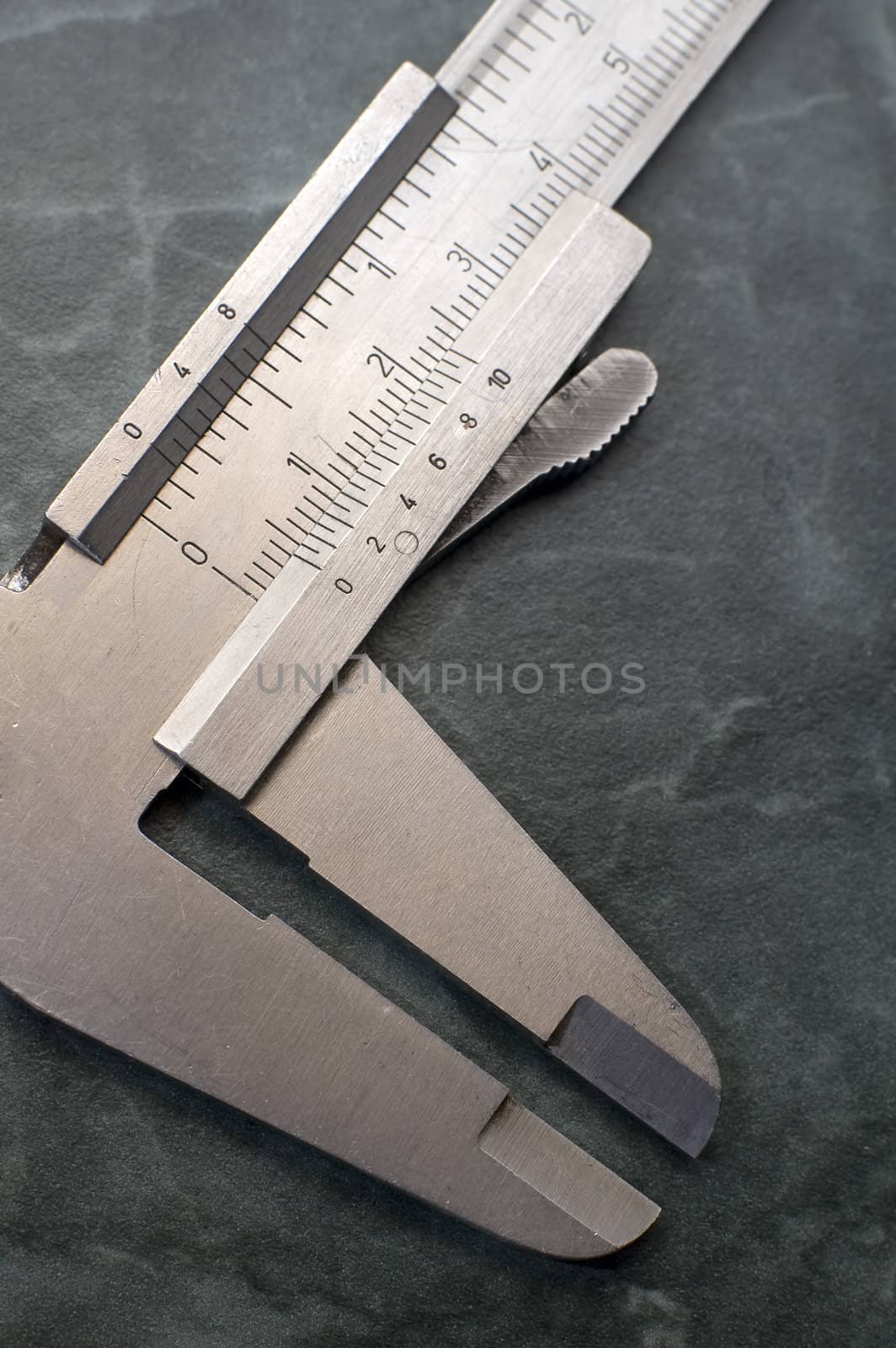 precision measurement tool made of steel, inches and millimeter, detail photo