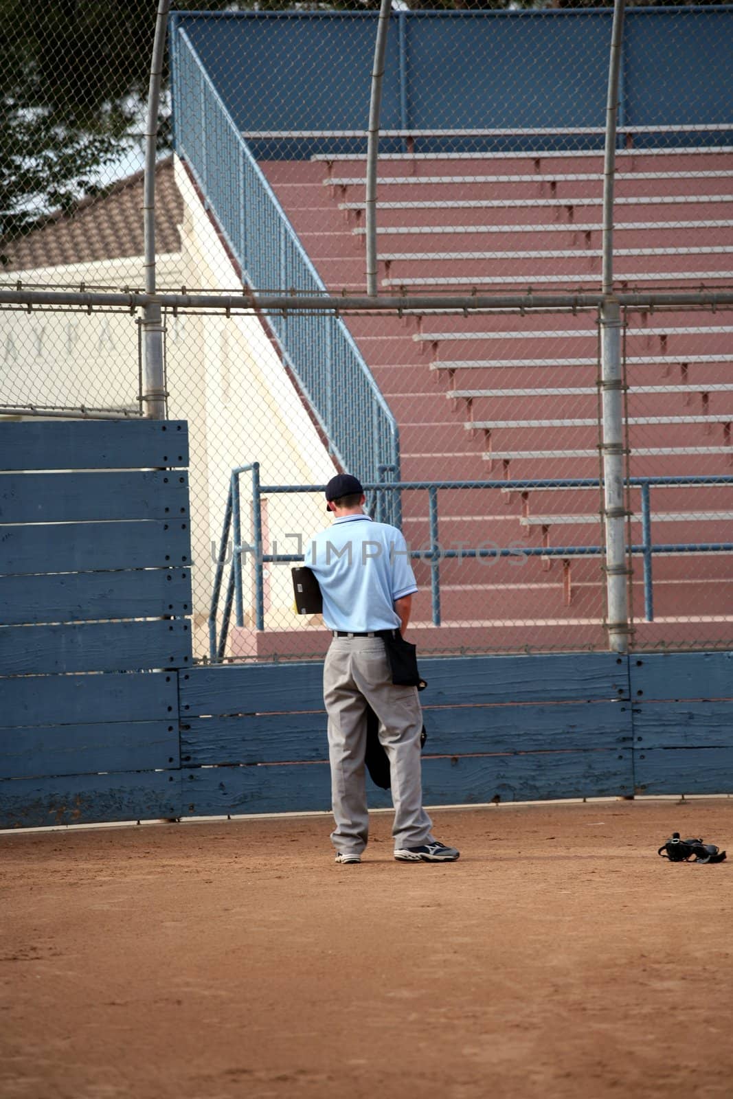 Umpire alone on the field
