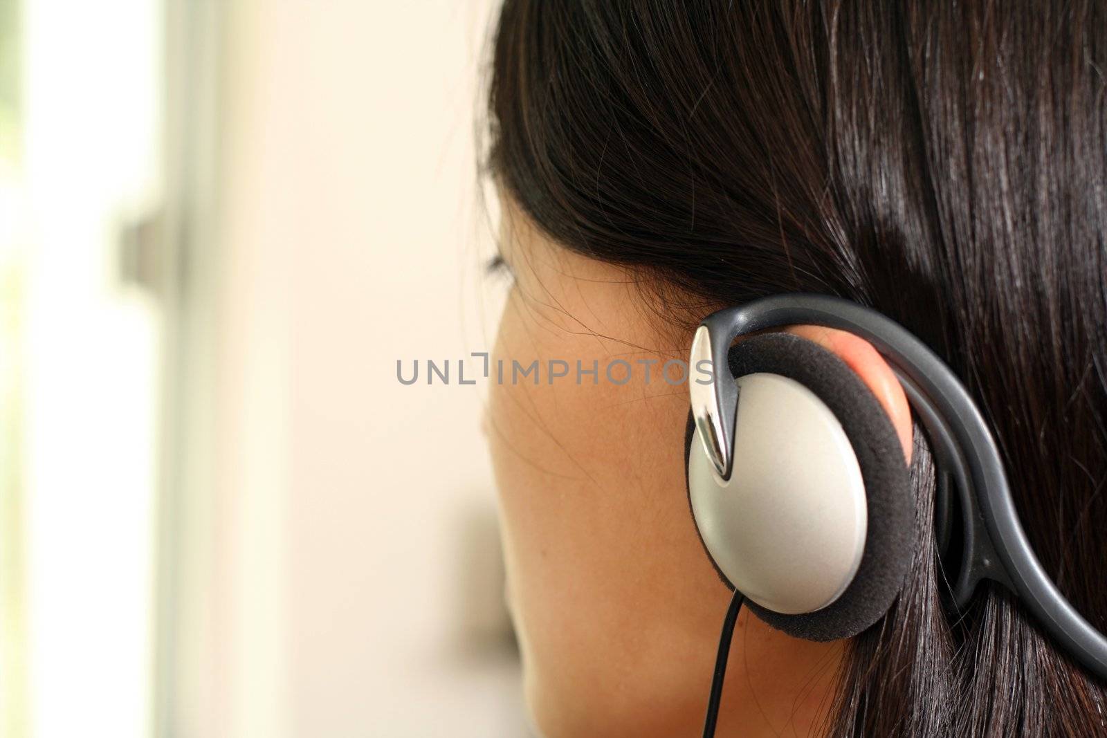 Listening to music by aremafoto