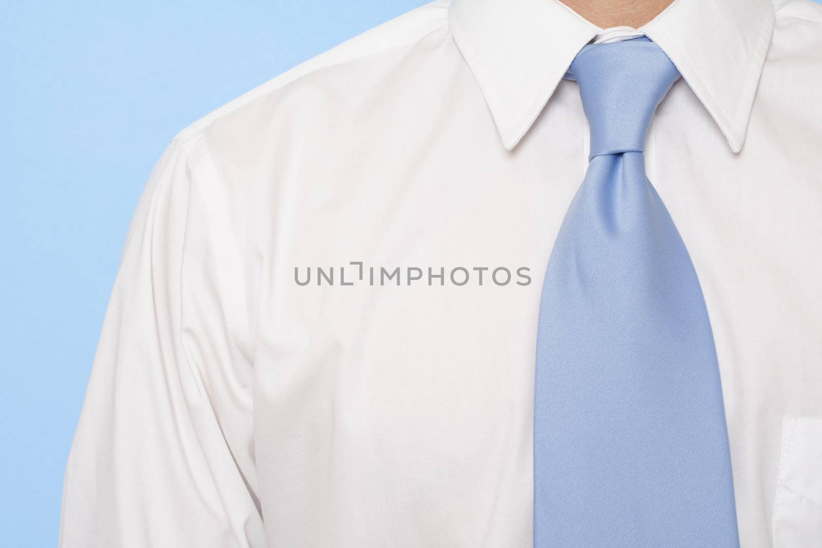 Businessman in formal business wear and blue tie