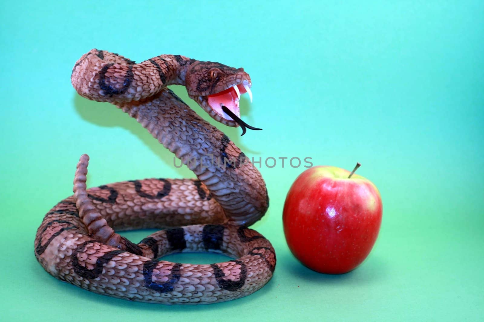 Snake and Apple in Garden with Adam and Eve by knktucker