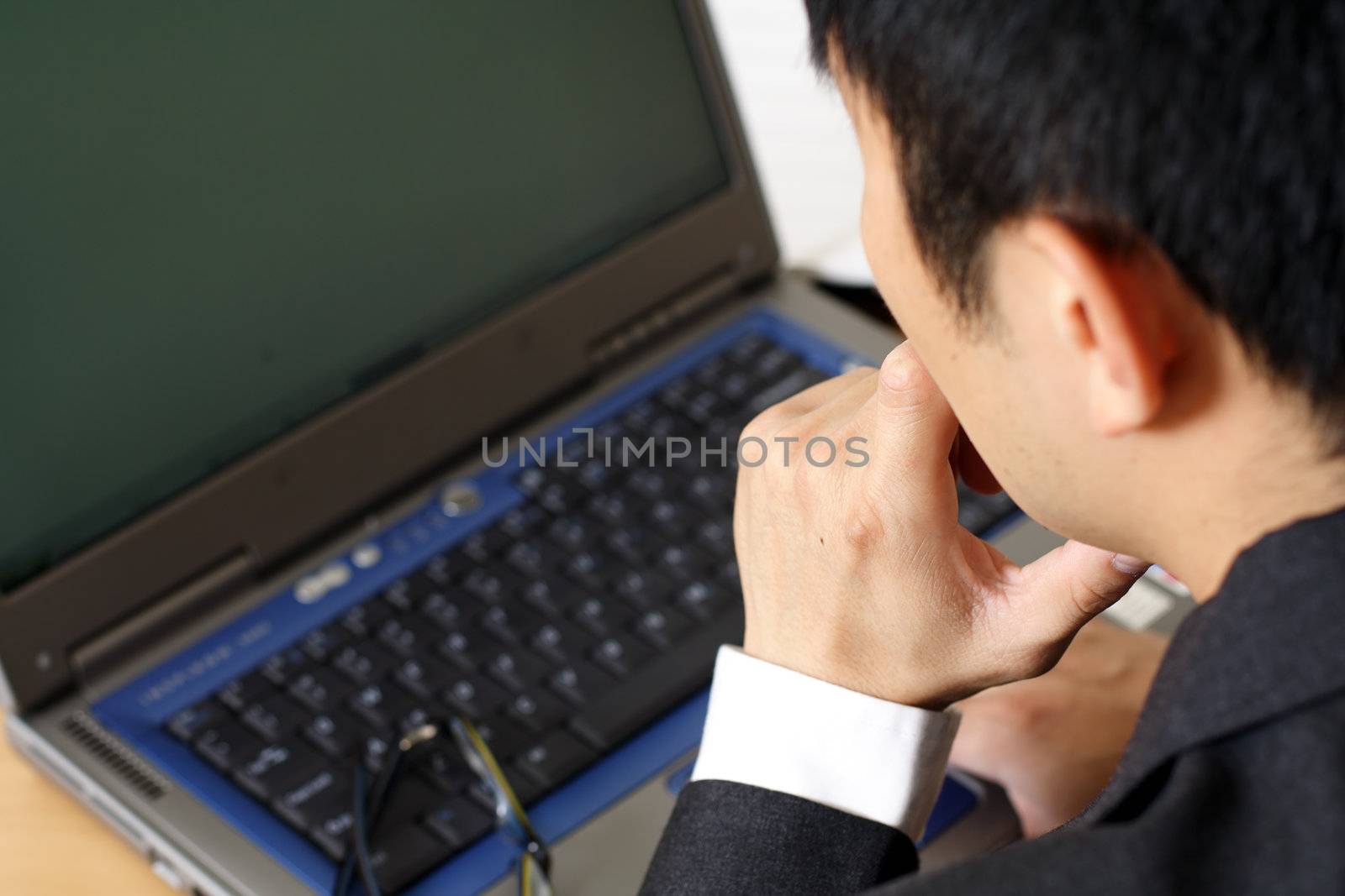 Businessman working on his laptop