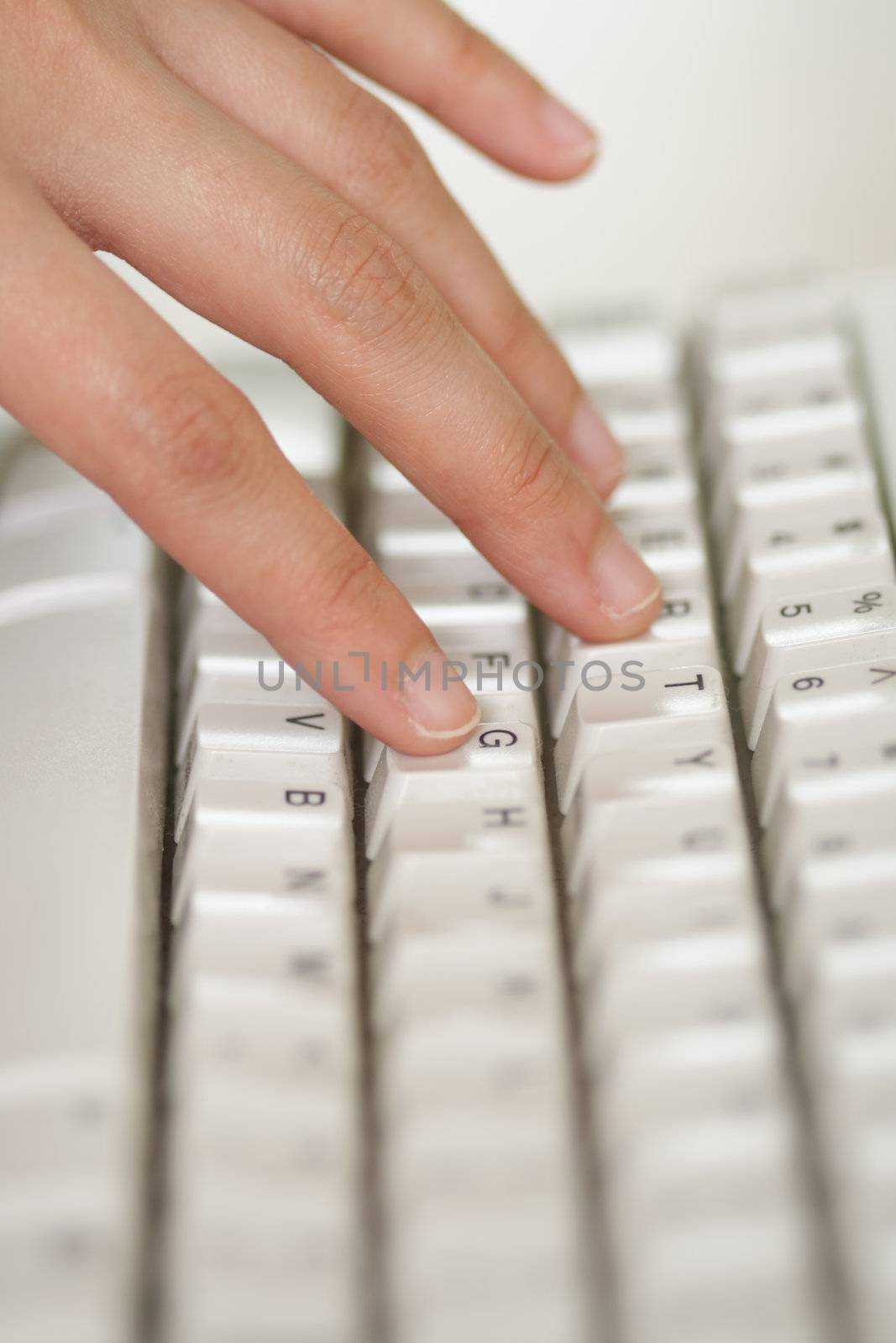 Hand touching on keyboard