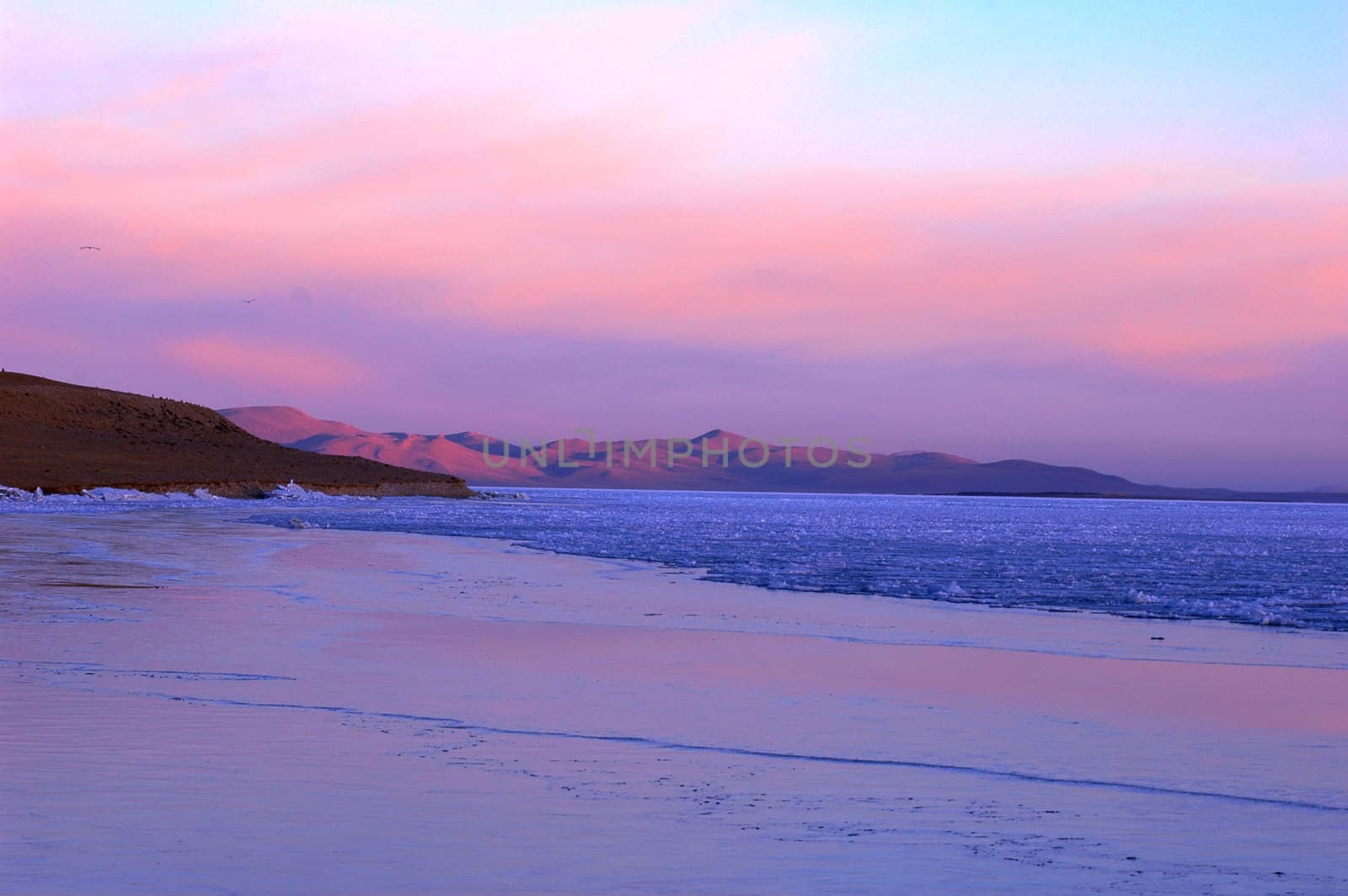 Landscape of lakeside at dusk in Tibet
