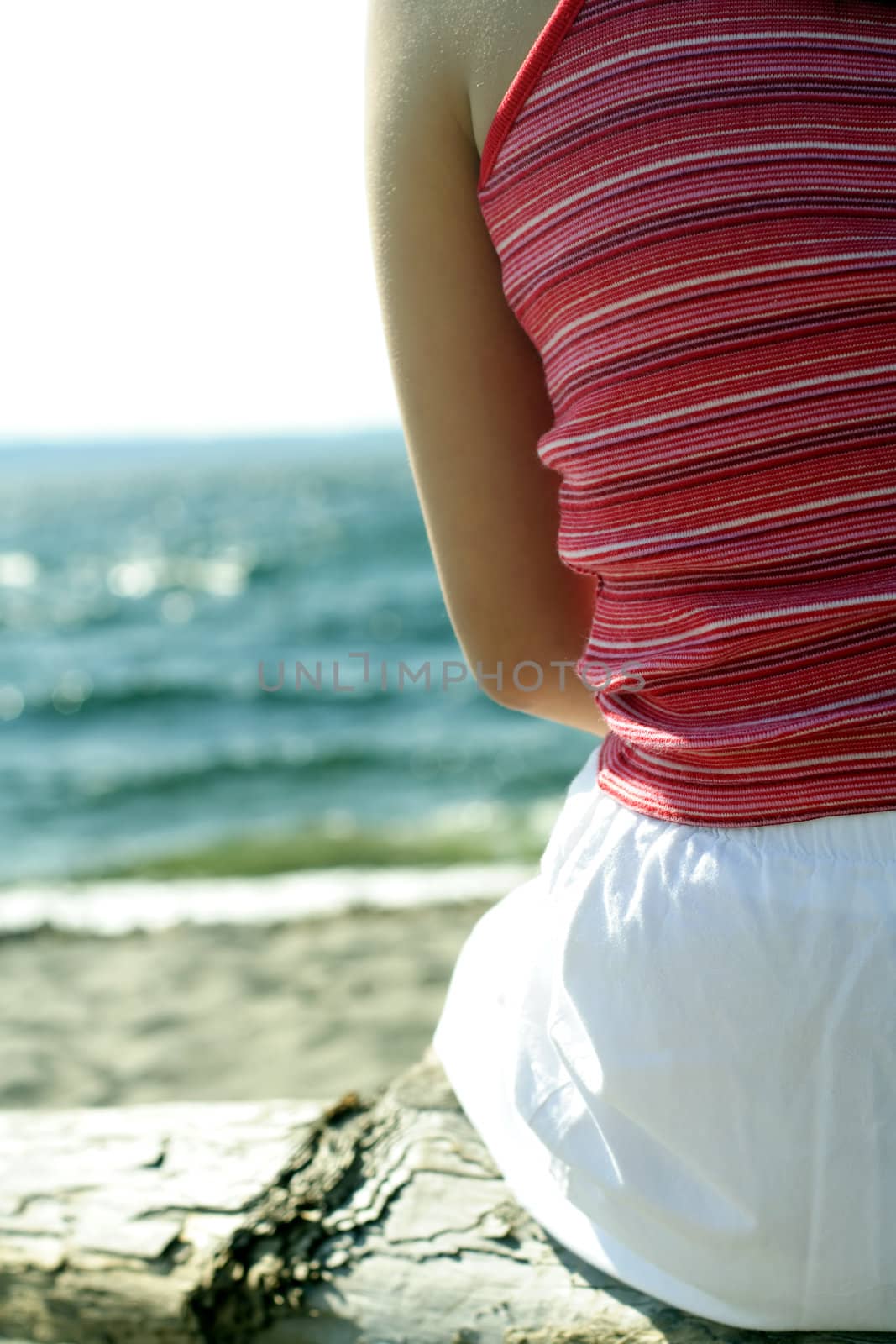 A woman relaxing on the beach