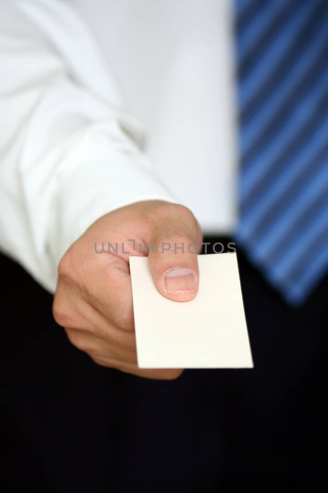 Businessman handing out a business card