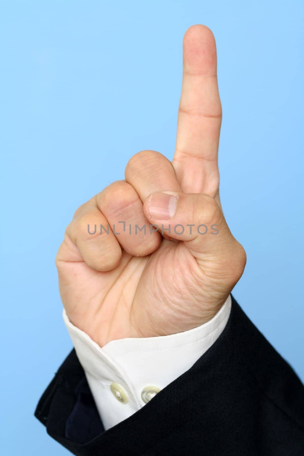 Businessman with raised index finger