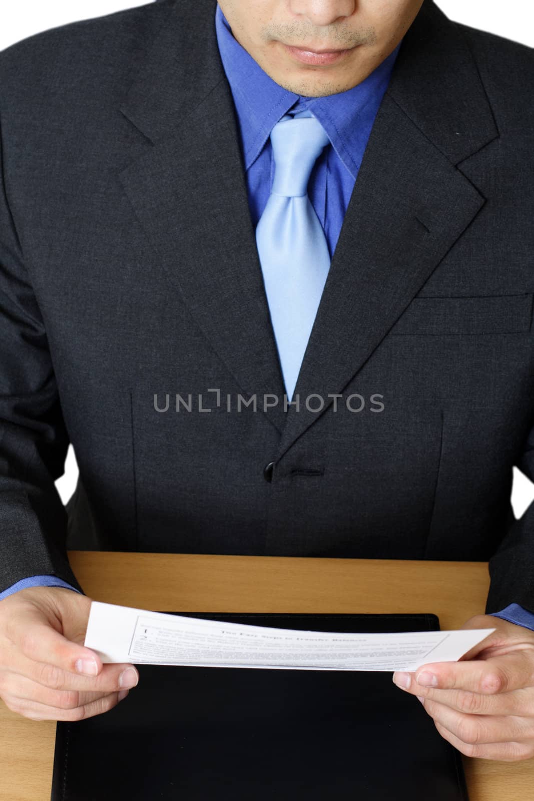 Businessman reading a letter