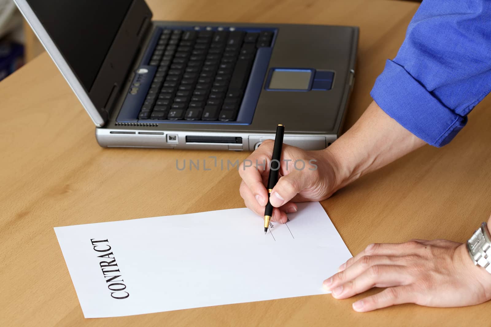 Businessman signing a contract