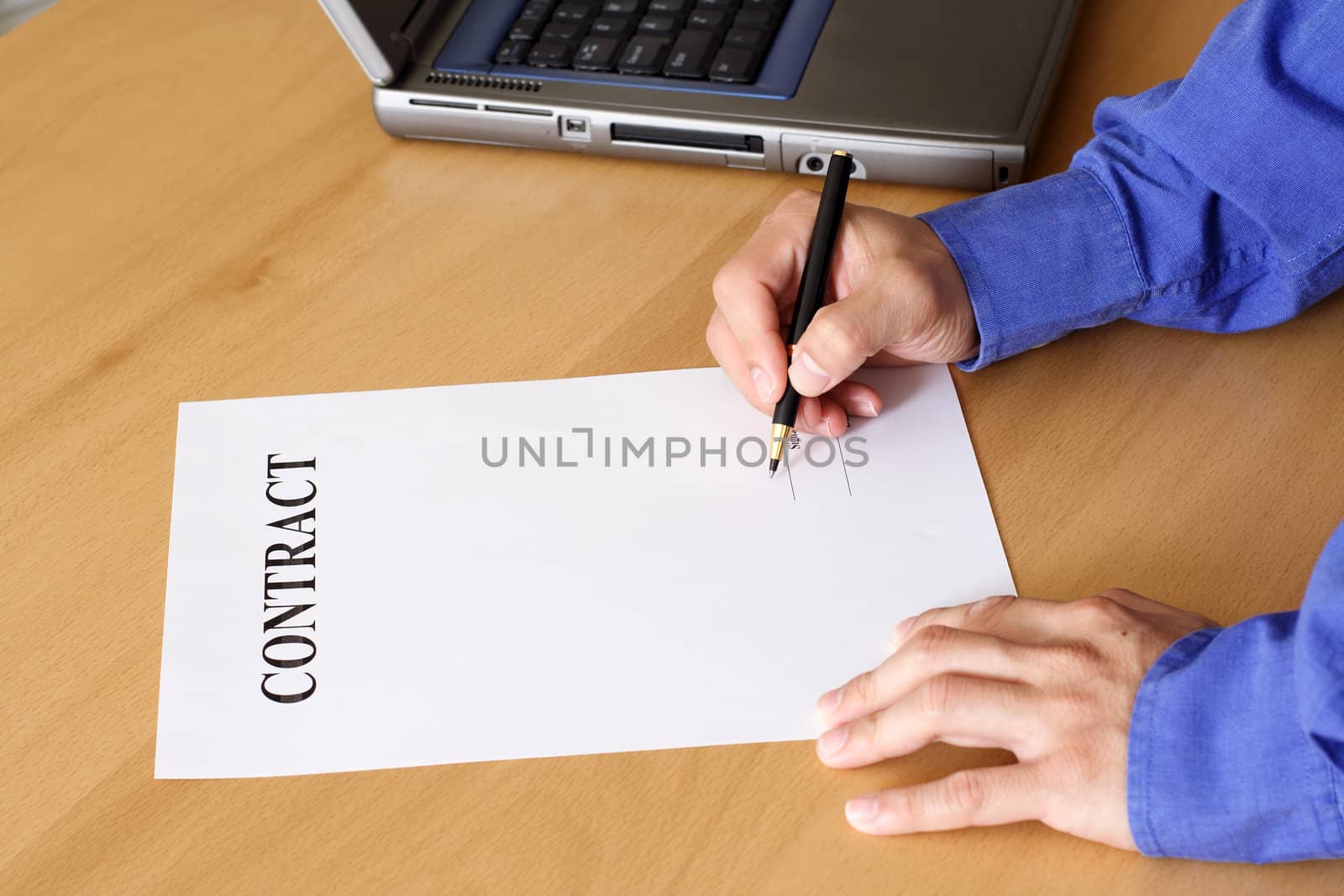 Businessman signing a contract