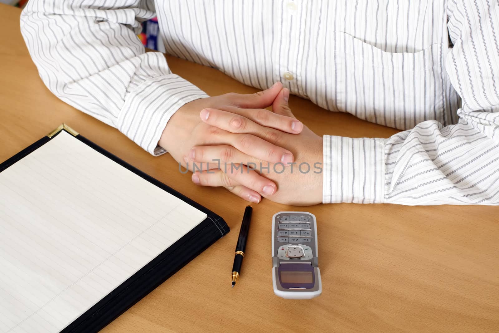 Businessman in meeting via conference call