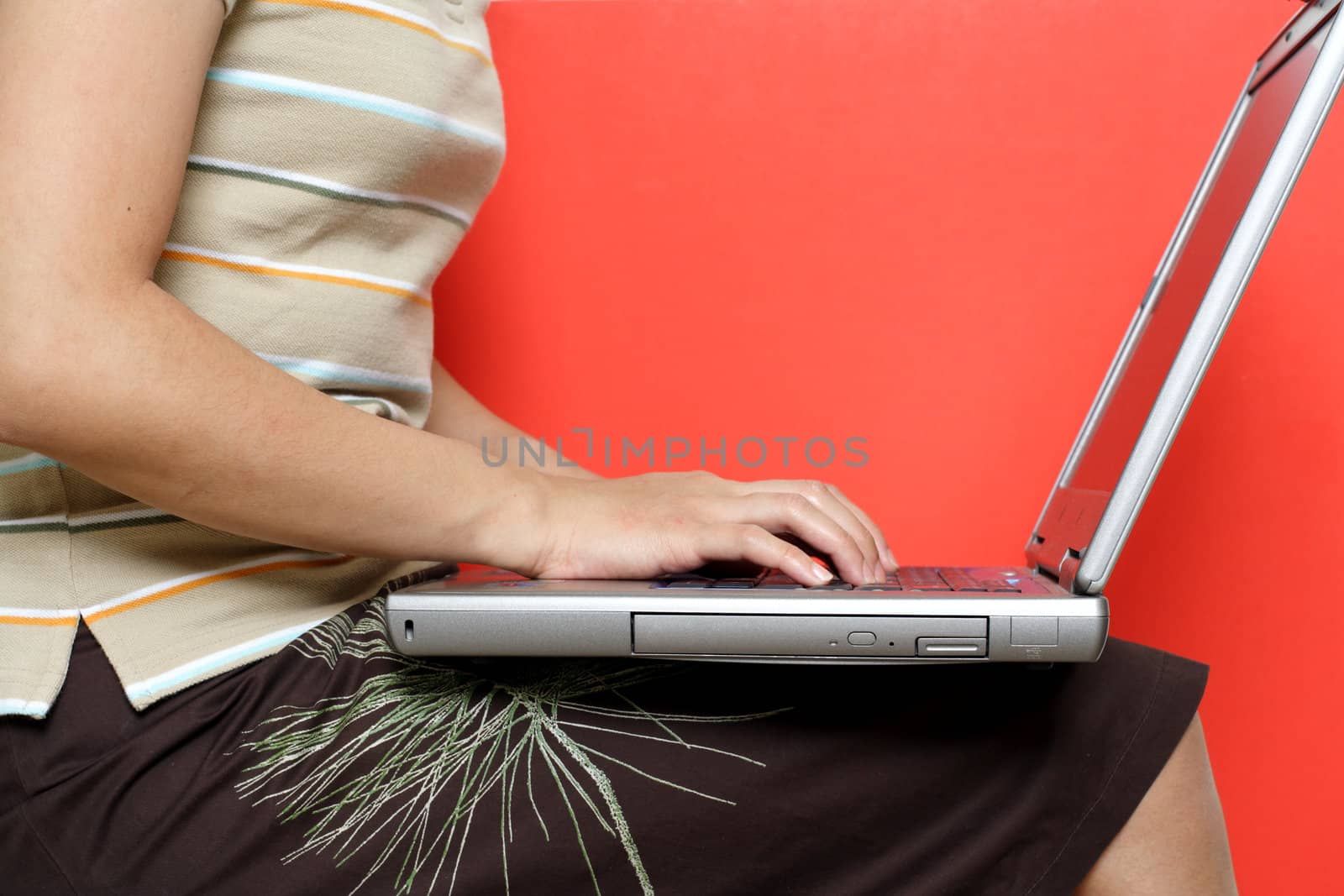 Woman and laptop by aremafoto