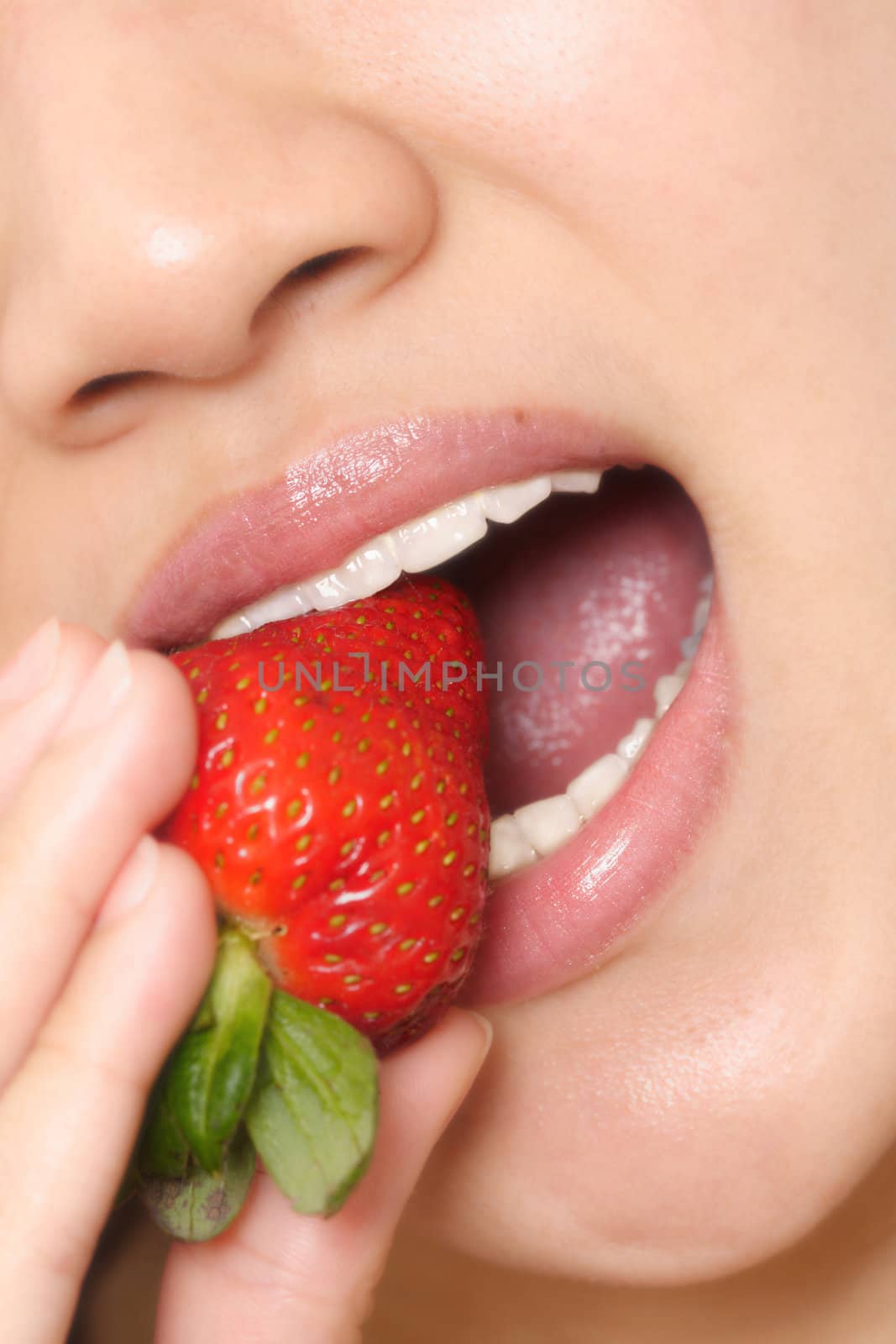 Woman and strawberry by aremafoto