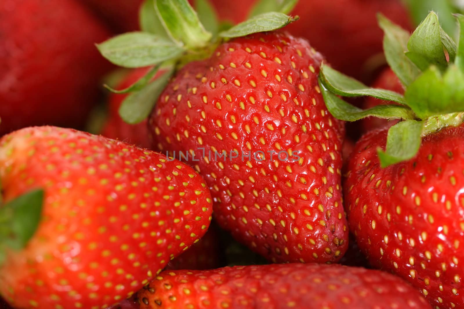 Red strawberries by aremafoto