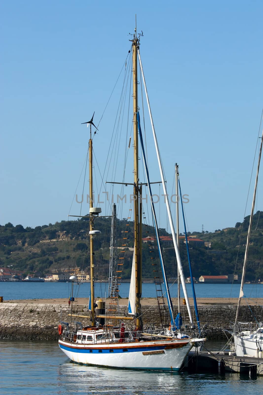 sailing boat in harbor by kalnenko