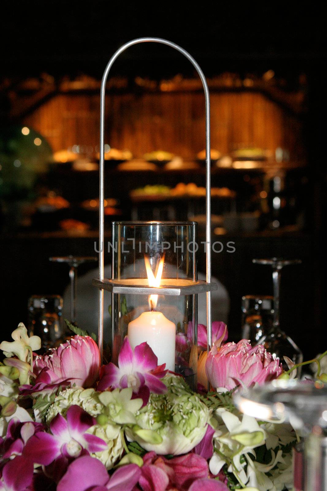 Tables decorated for a wedding reception.