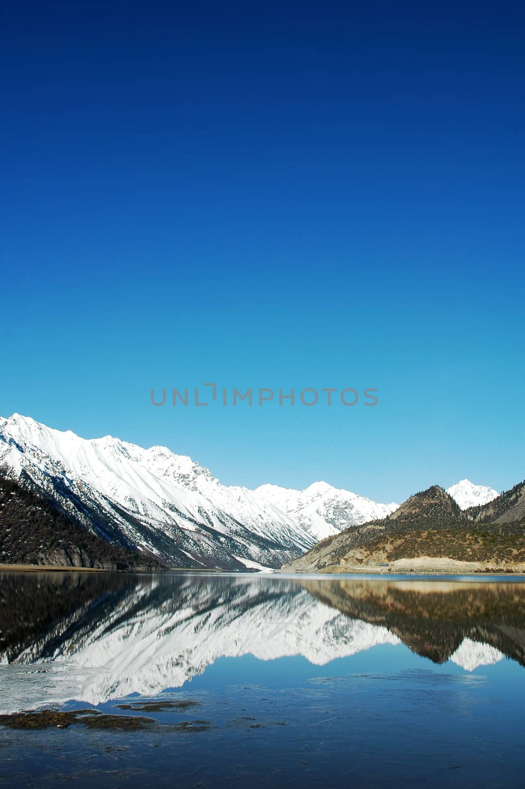 Landscape of snow mountains and lake in winter