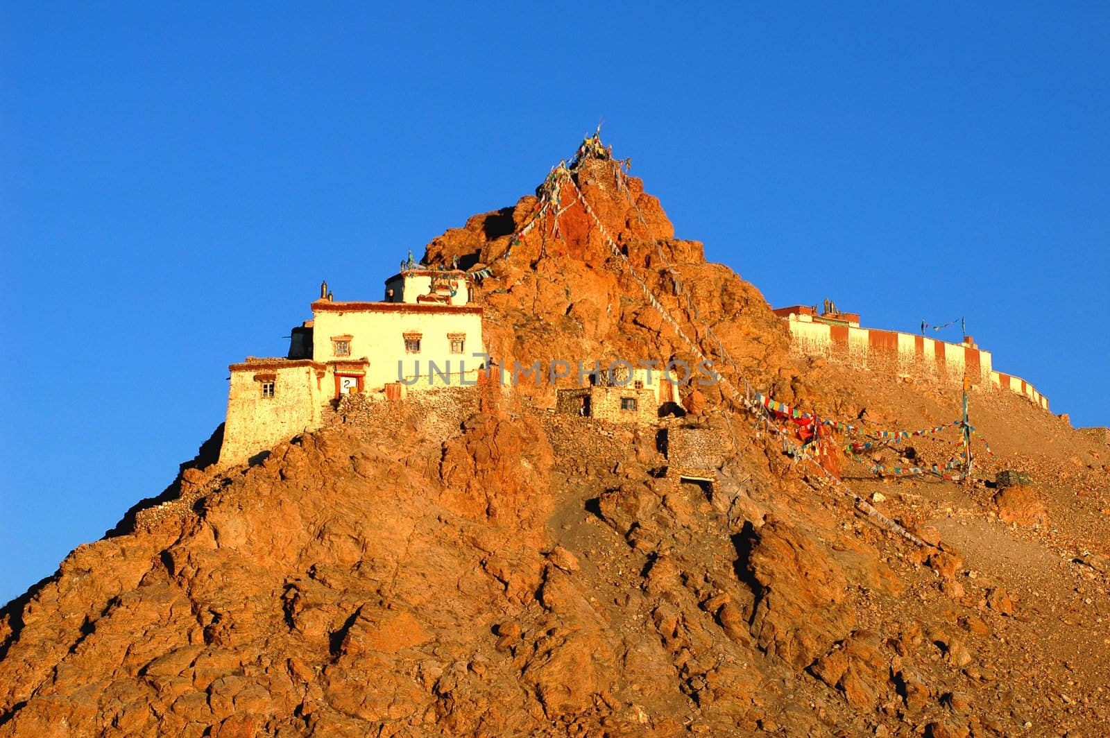 Landscape of small lamasery on the hills in Tibet