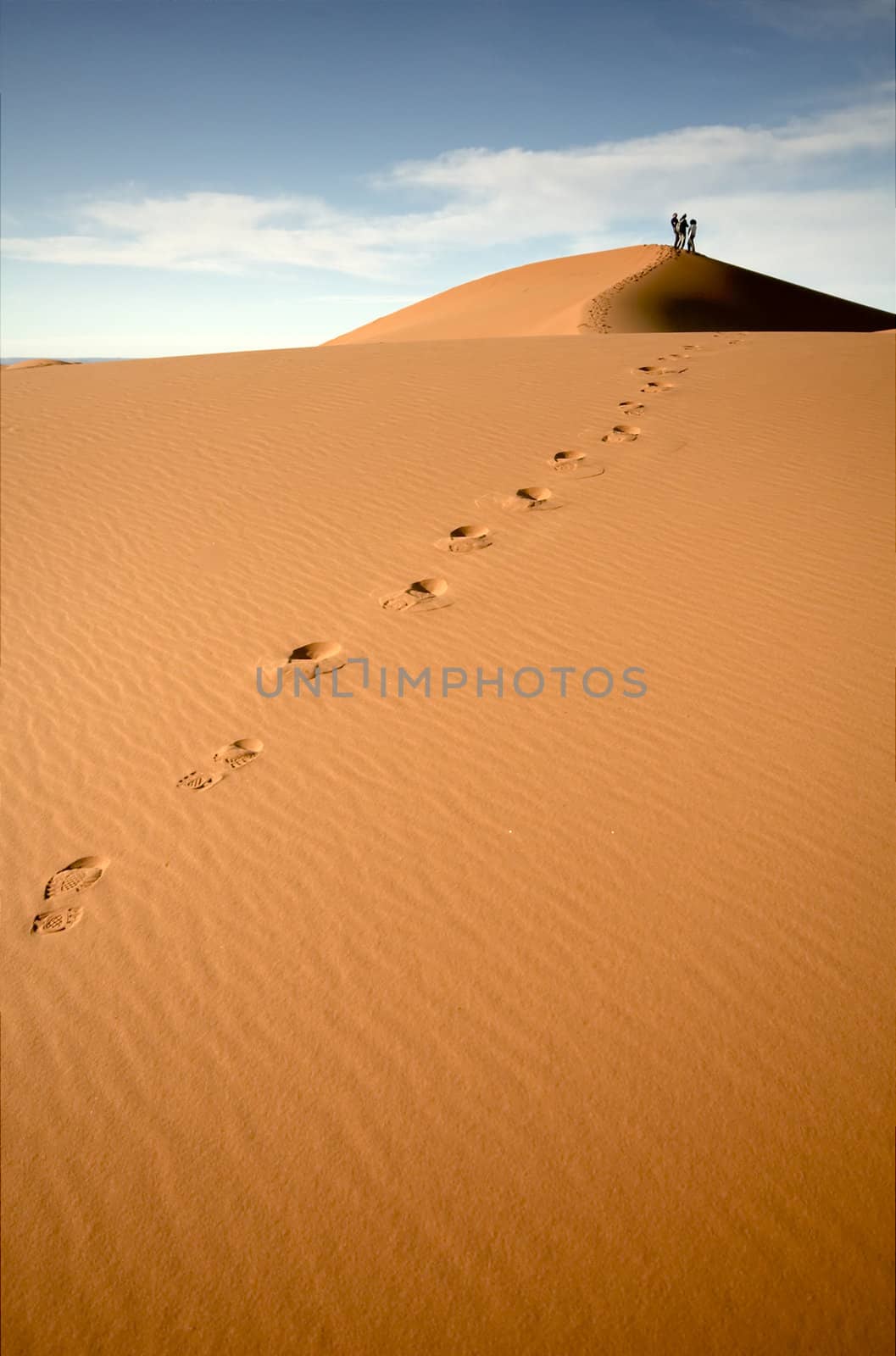 People at the dunes of the Moroccan Sahara