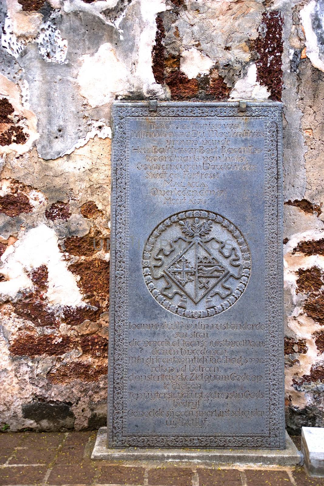 An ancient 17th century Dutch tombstone found at the ruins of St. Paul's Church, originally built by the Portuguese in 1521 at the UNESCO World Heritage site of Malacca, Malaysia.