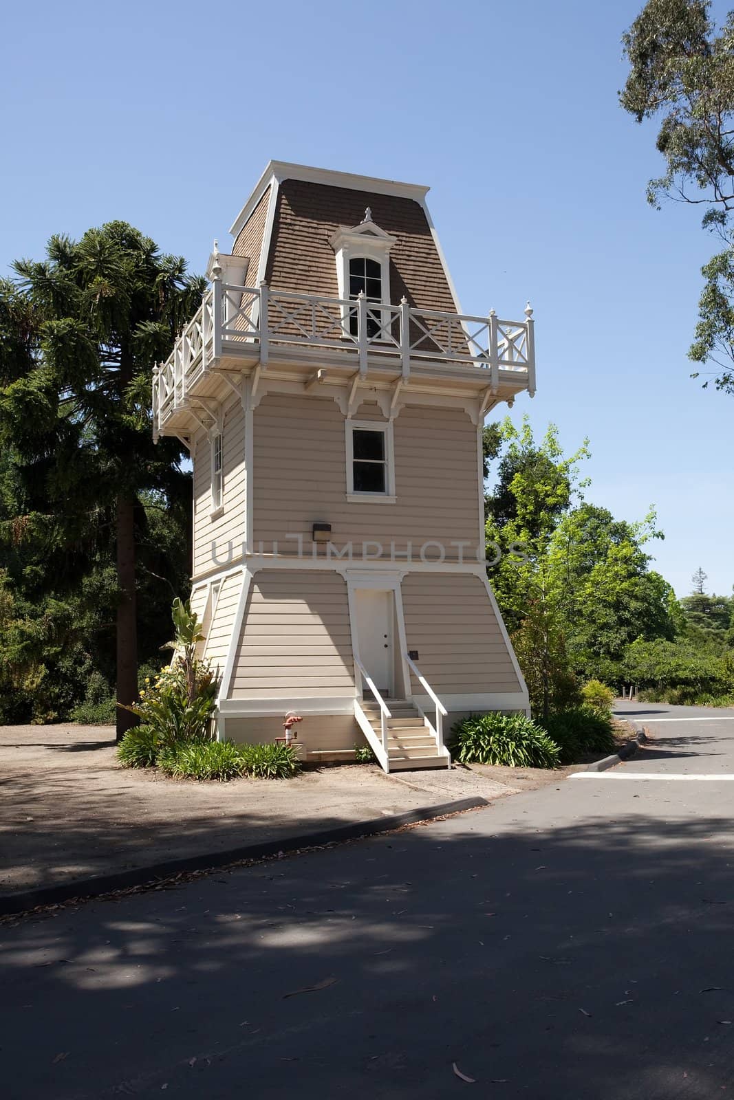 Water tower or elevated water tower is a large elevated water storage container constructed for the purpose of holding a water supply at a height sufficient to pressurize a water distribution system.