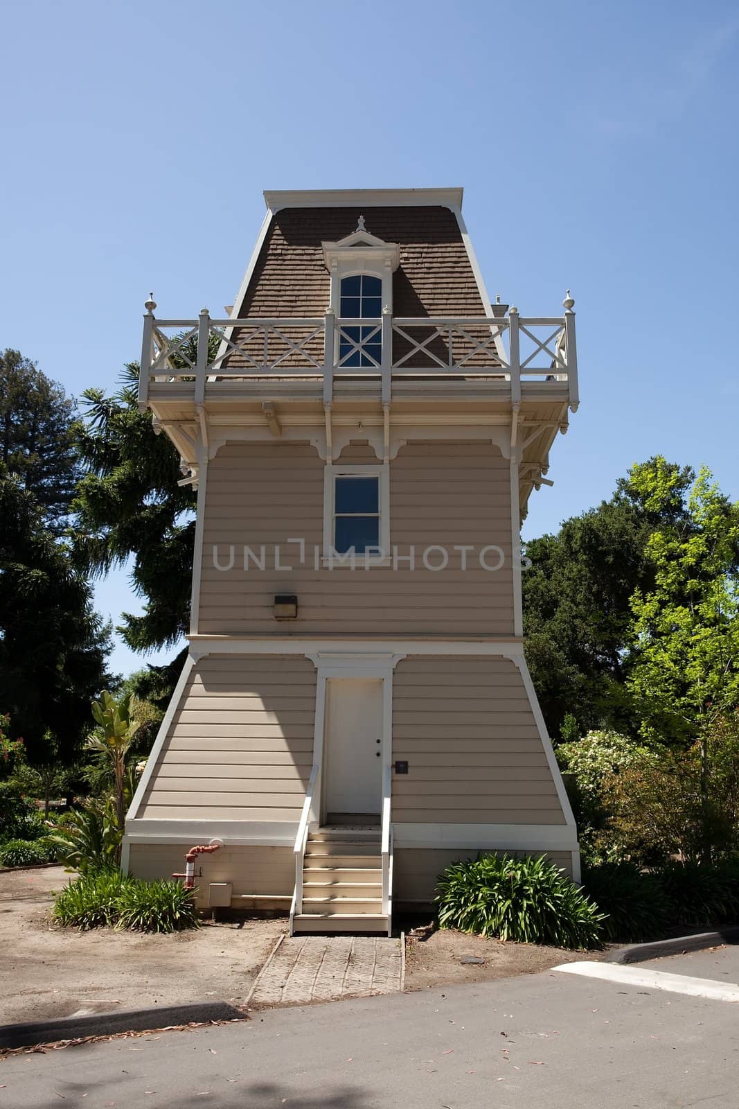 Water tower or elevated water tower is a large elevated water storage container constructed for the purpose of holding a water supply at a height sufficient to pressurize a water distribution system.