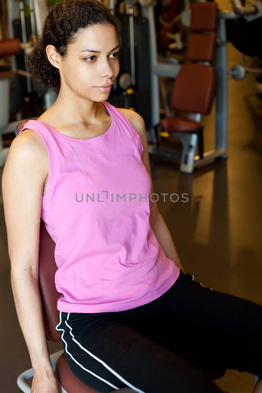 Pretty girl working out in the gym