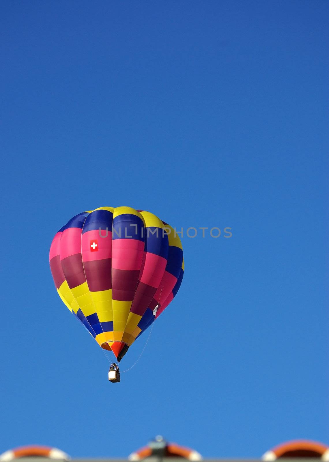 Hot air balloon in the blue sky.