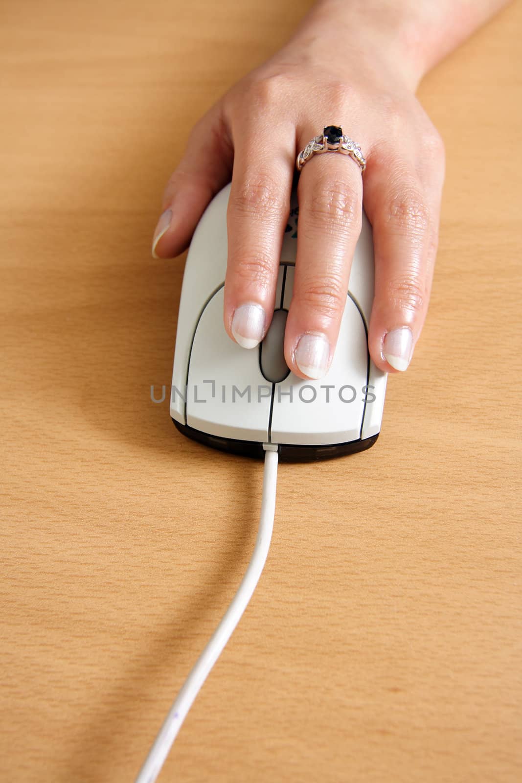 A businesswoman using a mouse