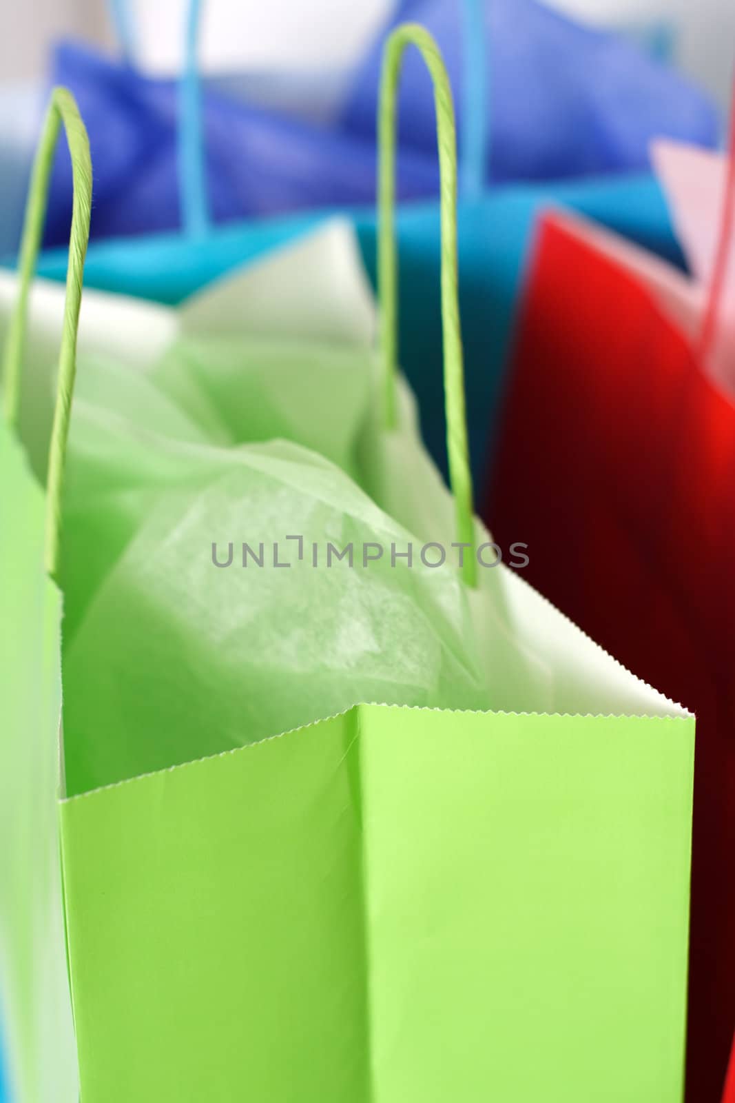 Three colorful shopping bags