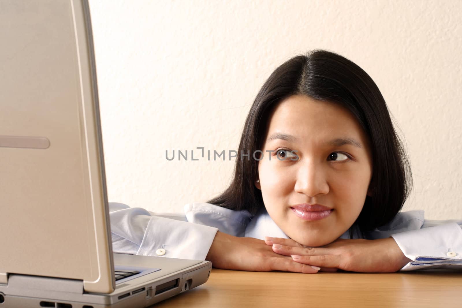 A businesswoman working at her office