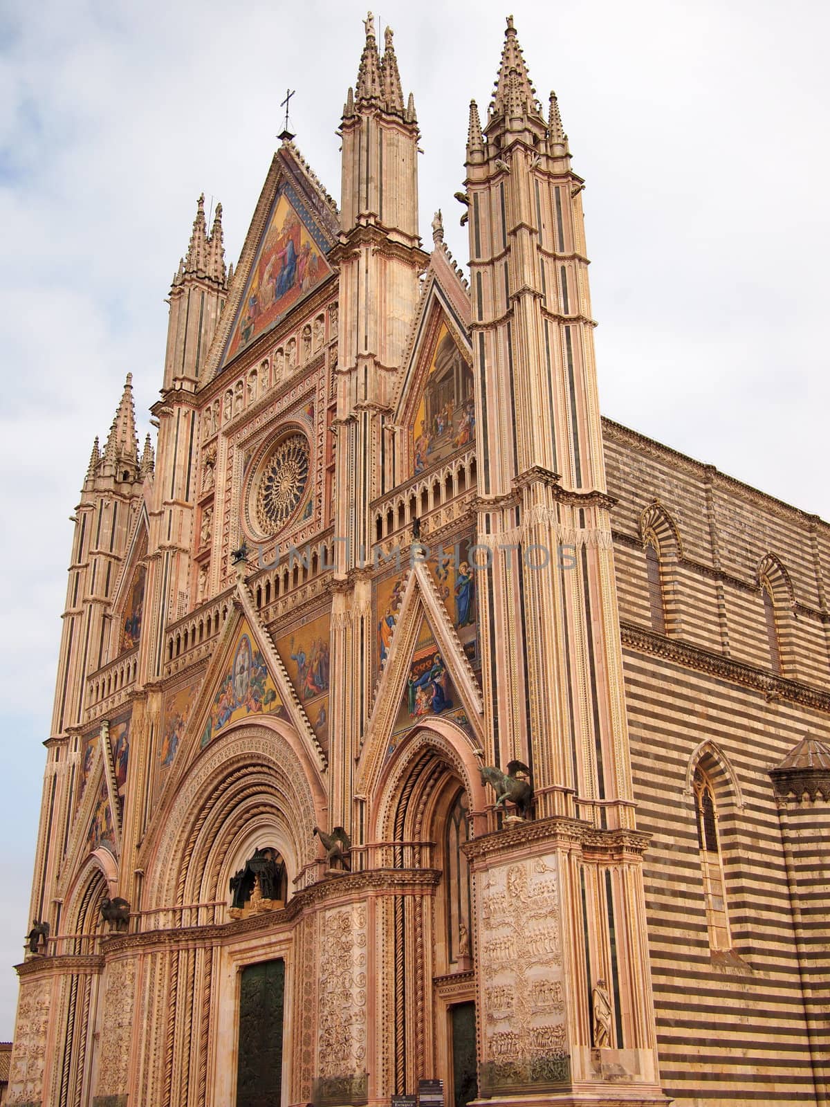 View of the front of the gothic cathedral of Ovieto, Italy.