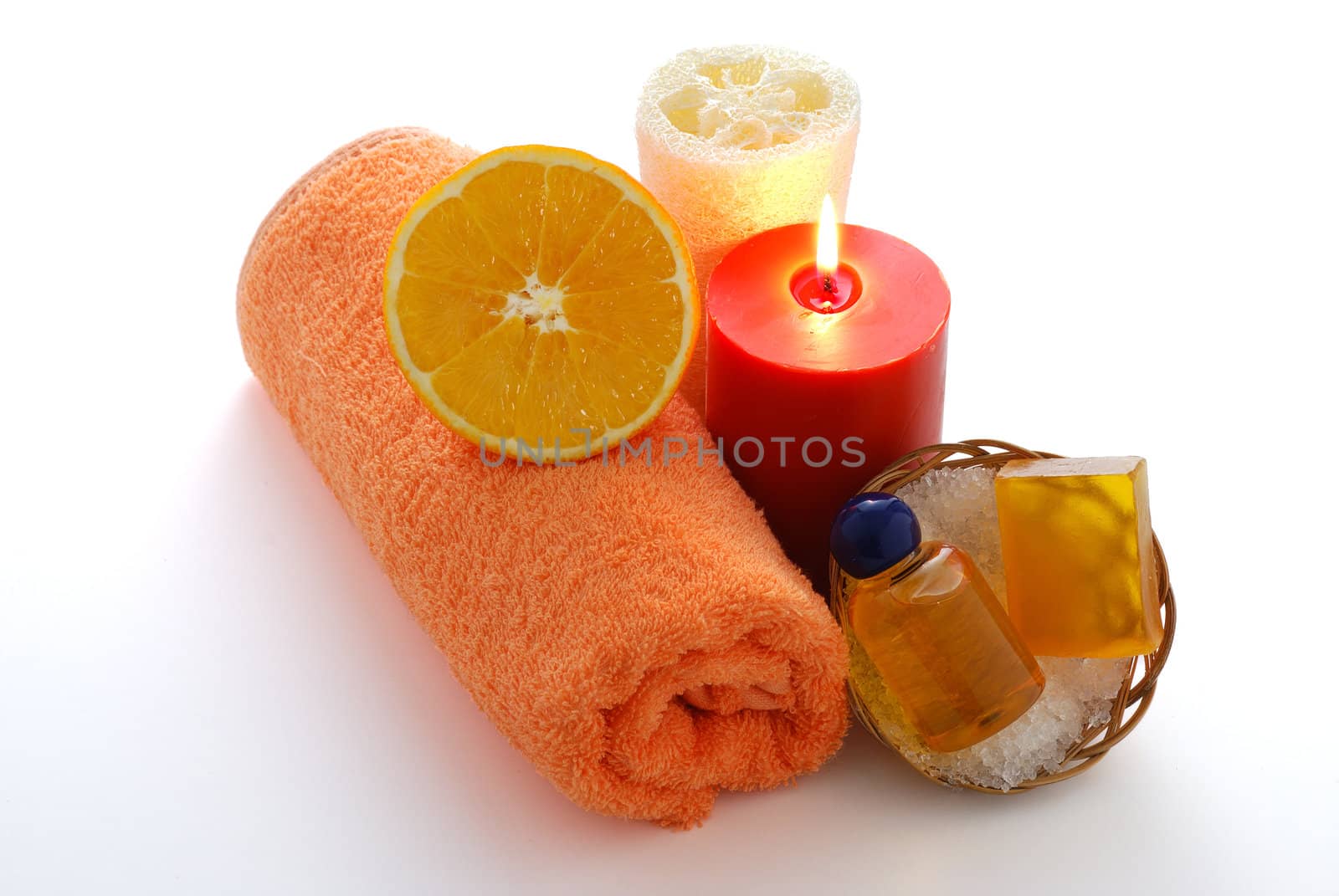 Orange flavored SPA including orange towel, sponge, candle, soap, shampoo and bath salt