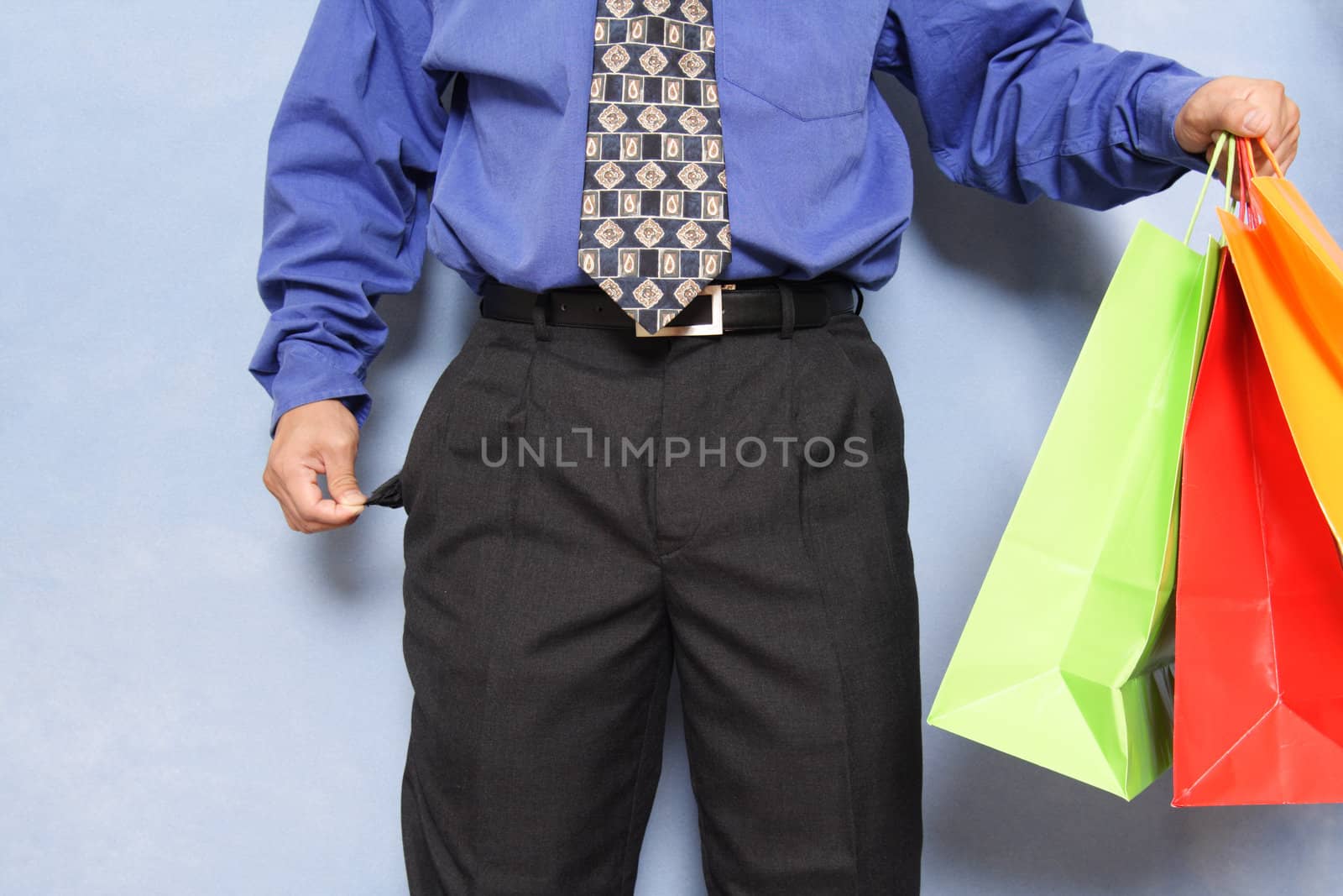 Businessman with no money left after shopping