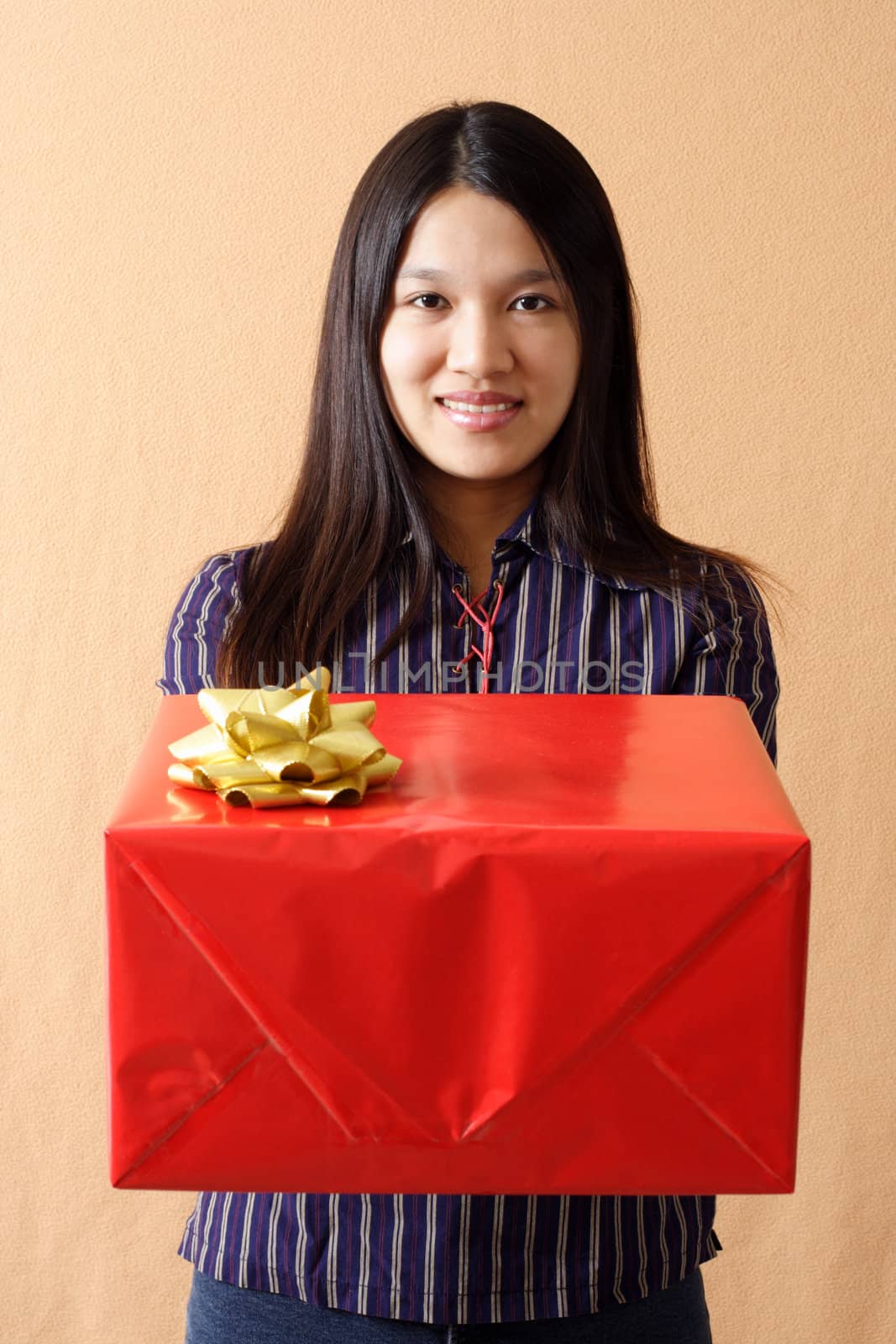 A woman holding a present