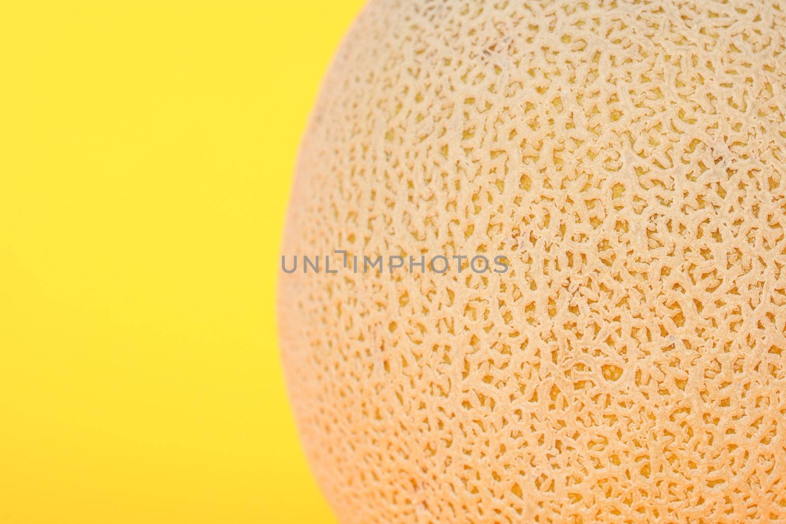 Cantaloupe with yellow background