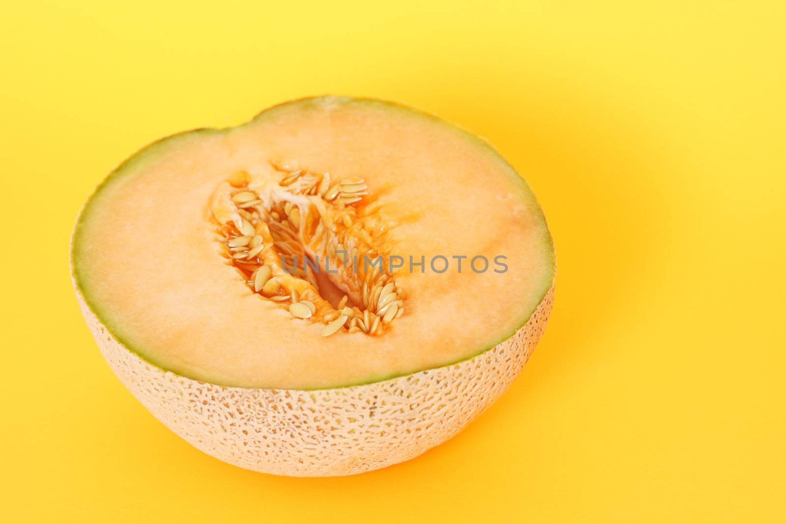 A cantaloupe cut in half