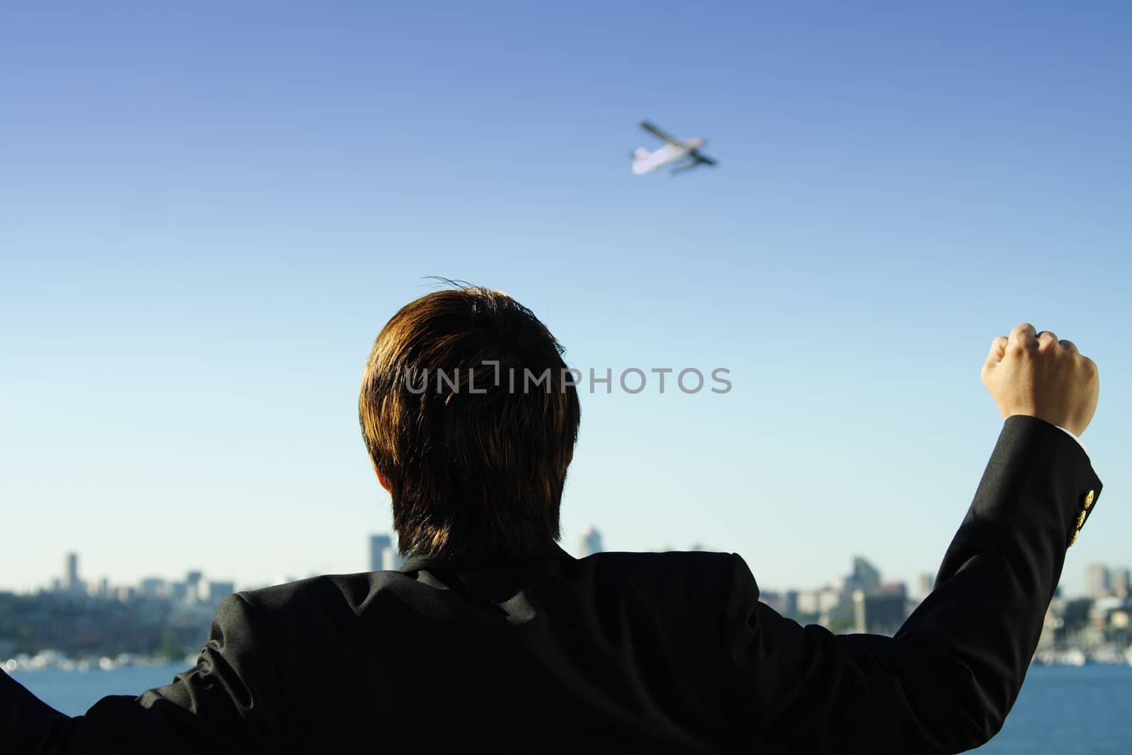 Happy businessman by aremafoto