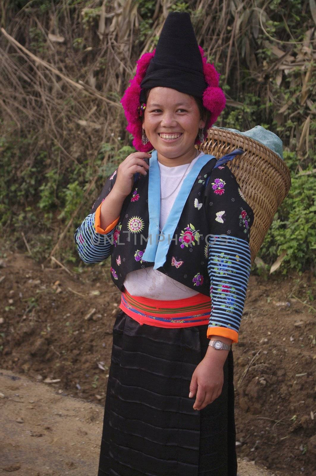 Red pompons Hmong	 girl by Duroc