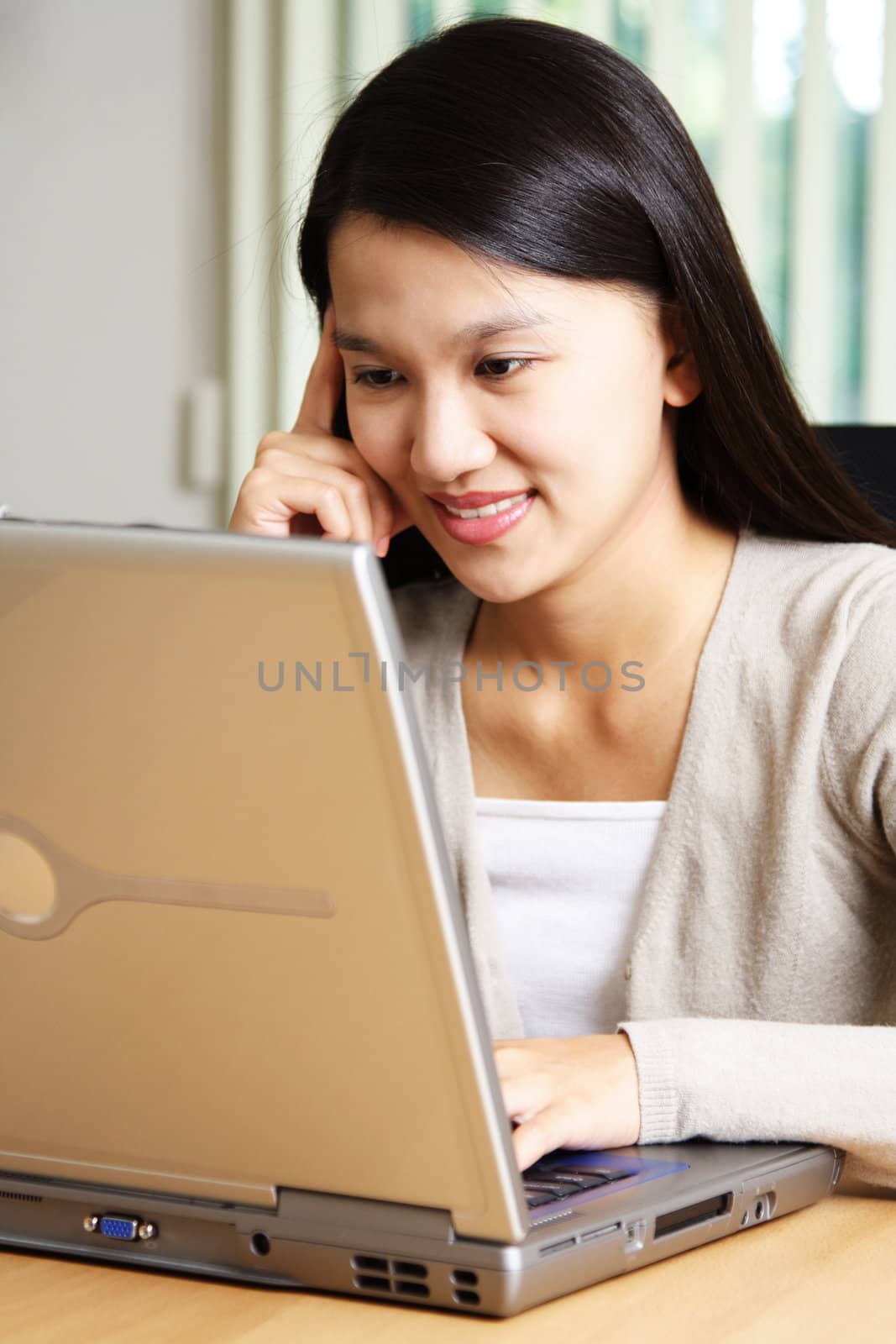 A businesswoman working on her laptop