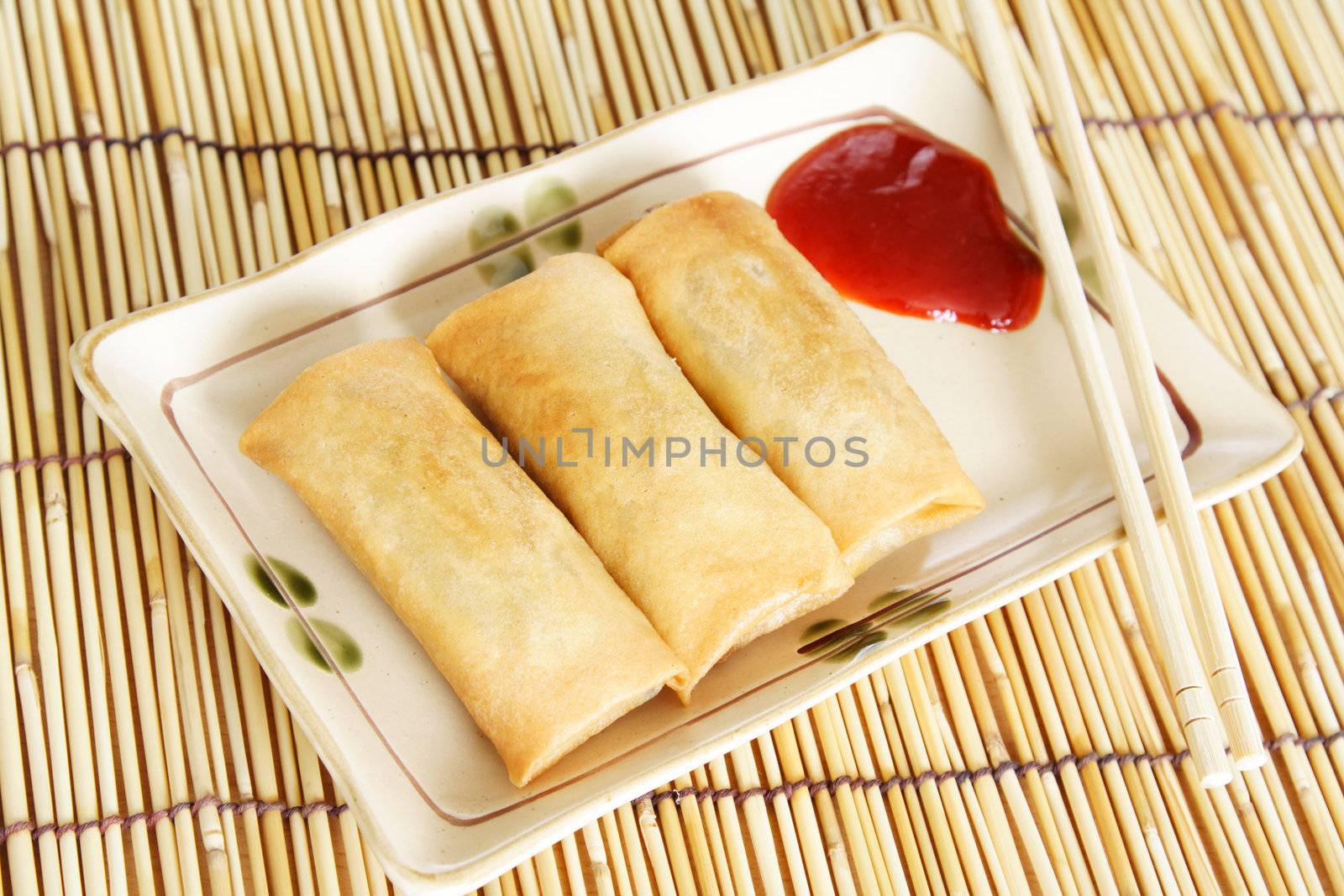 Crispy egg rolls on a plate