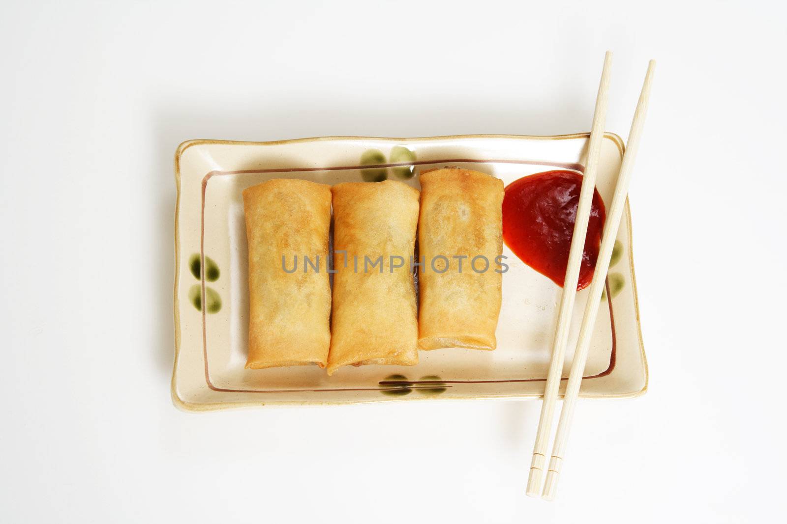 Crispy egg rolls on a plate