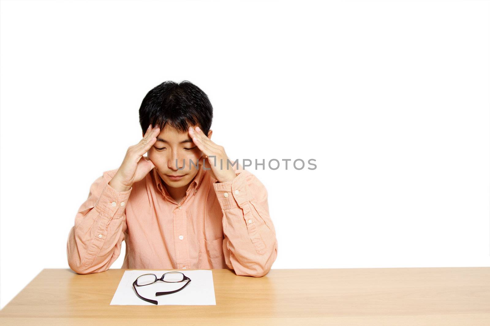 Businessman looking at a blank paper thinking hard