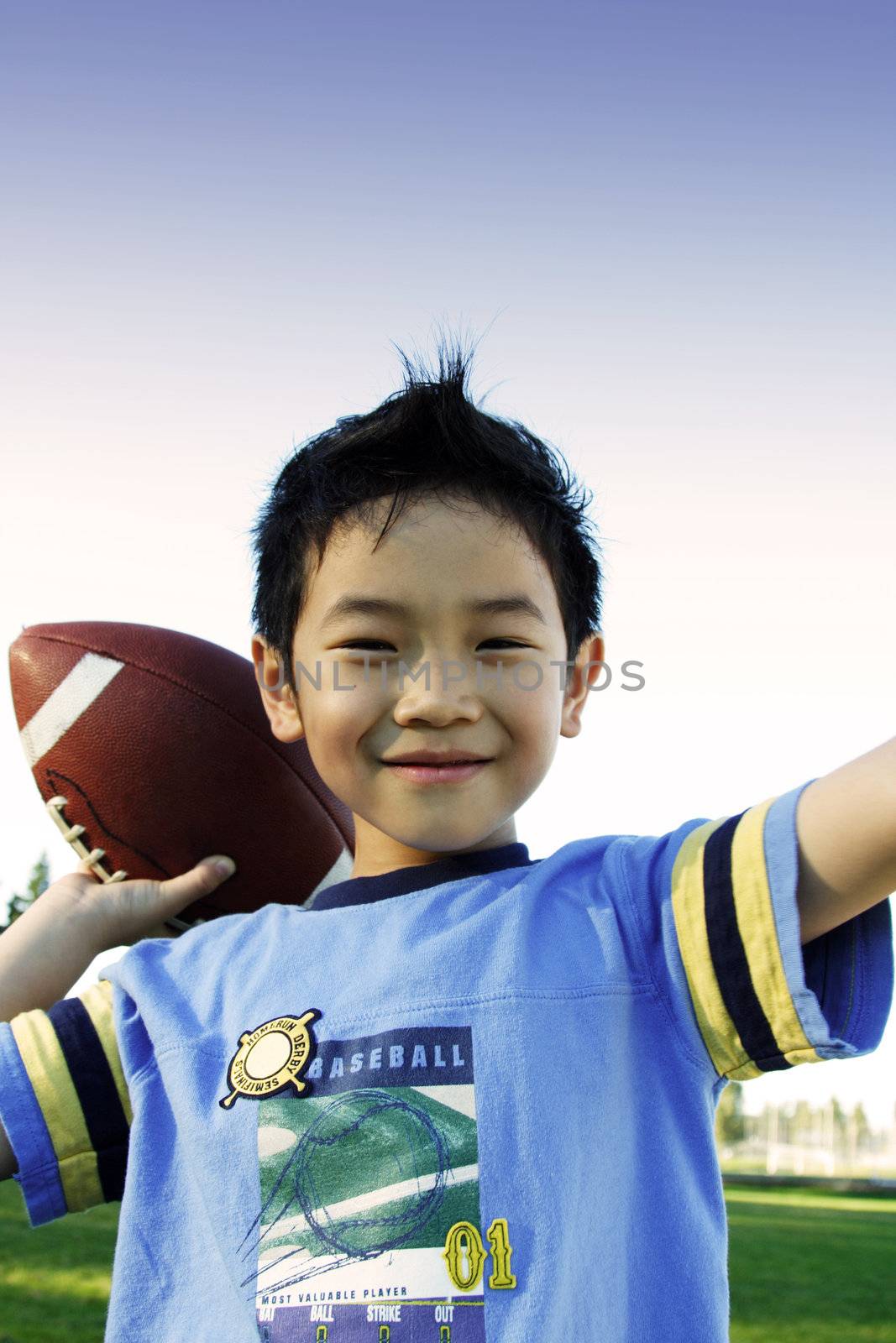 A boy throwing a football