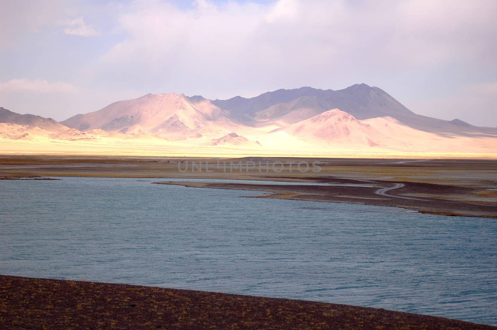 Landscape of mountains and lake in the highlands of Tibet