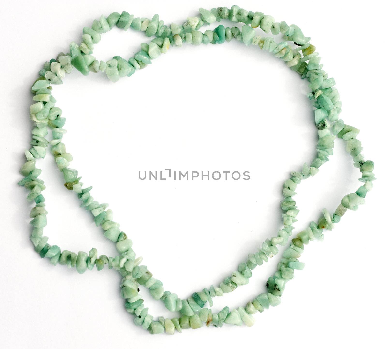 Amazonite gemstone chip bead necklace on white background with natural shadows