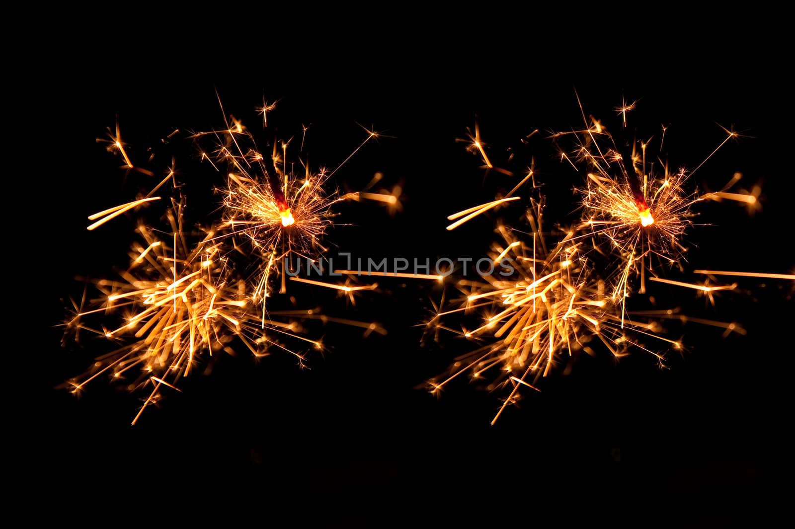 yellow and red sparkling fireworks by Ansunette