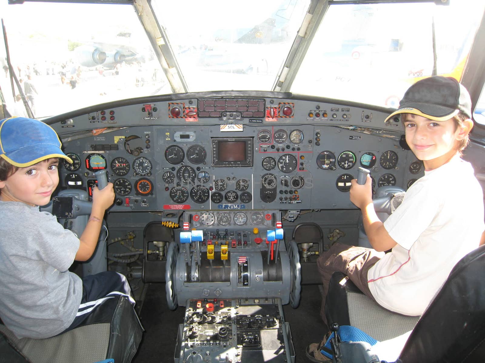 boys in a cockpit