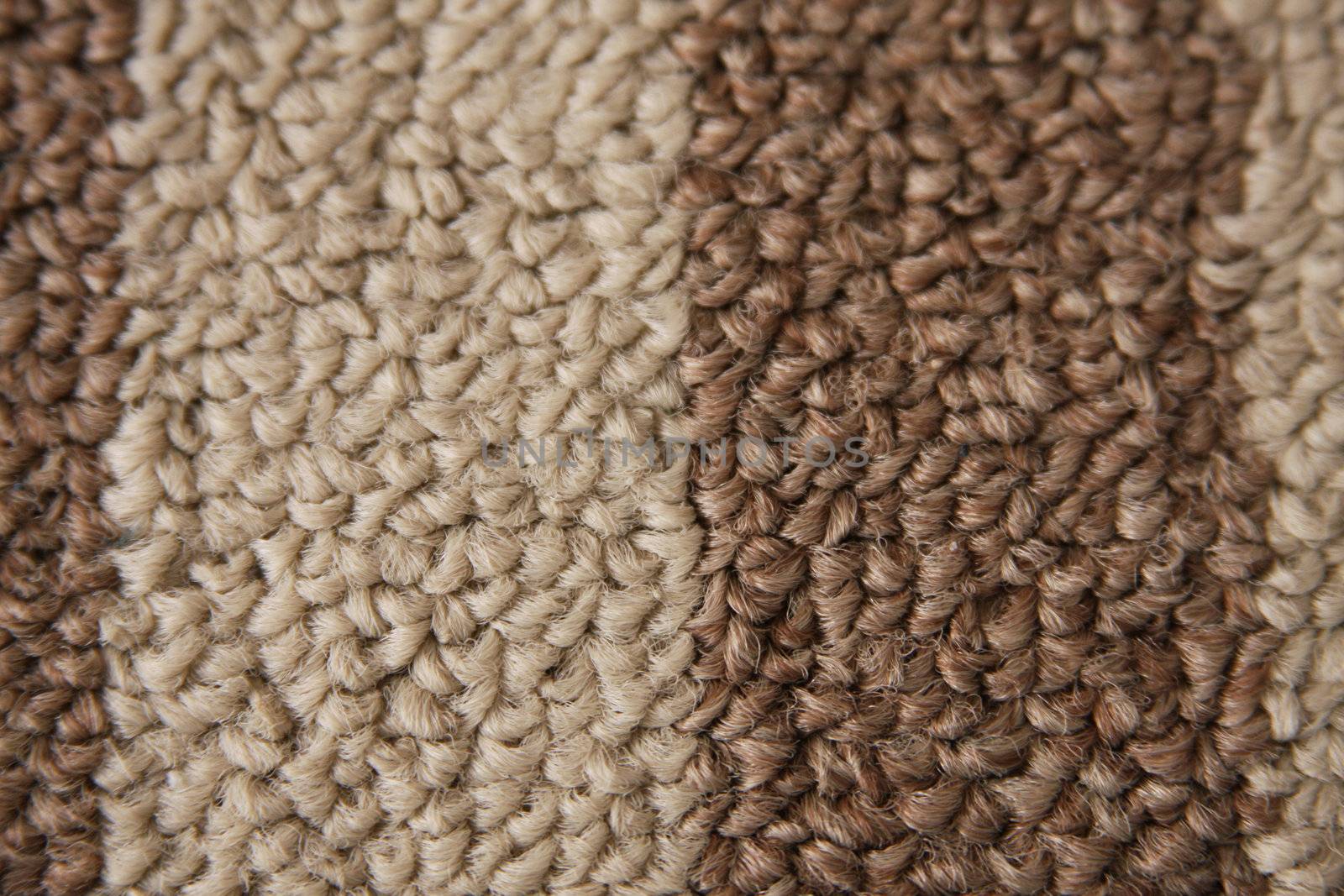 A close up of berber carpet as a background.