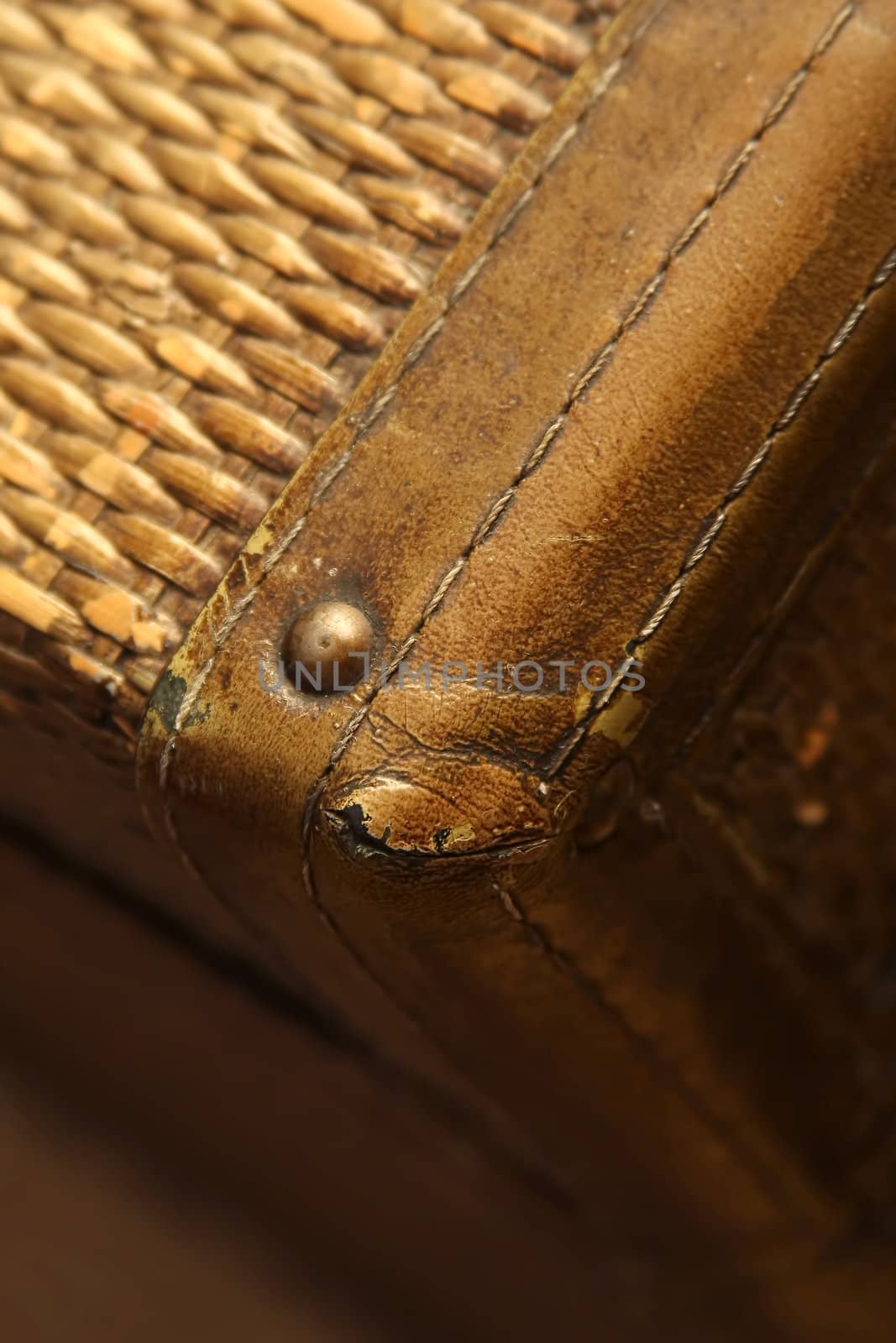 The  tattered corner of an old trunk or chest.